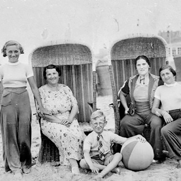 Melkman Family at the Seashore in Holland, 1934. Left to right: Flora van Brink Hony Bader (nee Melkman), mother Duifje Melkman, brother Harry Melkman, aunt Rebecca Veerman and sister Annie Melkman at the seashore in Holland.